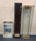 TWO TALL GLASS DISPLAY CABINETS, along with a smaller display cabinet Dimensions:shorter of the