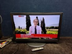 A PANASONIC TX-L42D25B 42in TV with remote and a Panasonic Blu-ray player (both PAT pass and