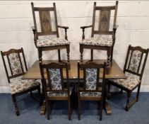 AN OLD CHARM RECTANGULAR DINING TABLE, raised on trestle-style legs, united by a stretcher, along