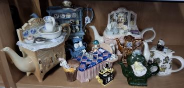 A COLLECTION OF NOVELTY TEAPOTS, comprising a Cardew Design dresser teapot, limited edition 667/