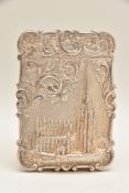 A 'NATHANIAL MILLS' SILVER CASTLE TOP CARD CASE, rectangular wavy form displaying a high relief