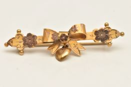 A VICTORIAN YELLOW METAL SWEETHEART BROOCH, bow and heart dropper design, stamped 9ct, fitted with a