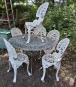 A CAST ALUMINIUM GARDEN TABLE AND SIX SIMILAR CHAIRS Dimensions:diameter 107cm Qty: 7 Condition