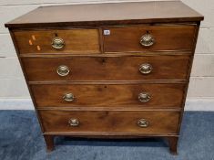 A GEORGIAN MAHOGANY CHEST OF TWO SHORT OVER THREE LONG GRADUATED DRAWERS, raised on bracket feet