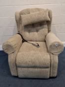 A WILLOWBROOK OATMEAL AND FOLAITE UPHOLSTERED ELECTRIC RISE AND RECLINE ARMCHAIR Dimensions:width