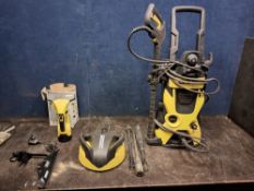 A KARCHER 3.575 PRESSURE WASHER with lance, three nozzles, patio head and extension and a window vac
