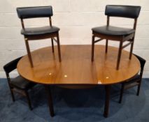 WHITE AND NEWTON Ltd, PORTSMOUTH, A MID-CENTURY TEAK EXTENDING DINING TABLE, with a single fold