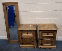 A PAIR OF PINE BEDSIDE CABINETS, with a single drawer and cupboard door, along with a similar wall
