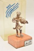 AN ISRAELI WHITE METAL FIGURE, depicting a violinist, on a hard stone base, signed Ben Zion