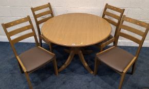 A MODERN DROP LEAF TABLE, raised on a single pedestal with four legs, along with a set of four H J