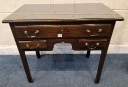 A GEORGIAN OAK LOWBOY, fitted with three assorted drawers and a glass surface protector Dimensions: