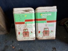 TWO VINTAGE OVOLINE OILS 25 LITRE OIL CANS Dimensions:49cm high Qty: 2 Condition Report:surface rust