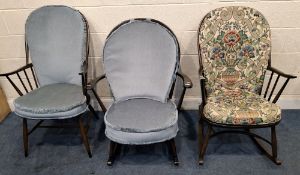 LUCIAN ERCOLANI, THREE DARK ELM AND BEECH ERCOL CHAIRS, comprising two rocking chairs and another