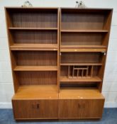 G PLAN FRESCO, A MID-CENTURY TEAK WALL UNIT, with an arrangement of shelves, divisions and doors,