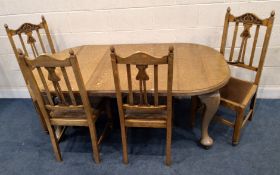 AN EARLY 20TH CENTURY OAK WIND OUT DINING TABLE, with one additional leaf, raised on cabriole legs