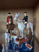 A GROUP OF BESWICK FIGURES INCLUDING HUNTSMAN AND HUNTSWOMAN PLUS HOUNDS, comprising Huntsman