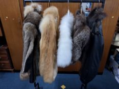 FIVE FUR/ FUR STYLE COATS, a selection of coats in various colours and some with leather panels,