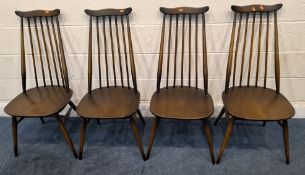 LUCIAN ERCOLANI, A SET OF FOUR ERCOL DARK ELM AND BEECH GOLDSMITH CHAIRS Qty: 4 Condition Report: