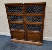 A 20TH CENTURY MAHOGANY BOOKCASE, with six lead glazed fall front doors over double cupboard doors
