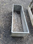 A MODERN GALVANISED STEEL FEED TROUGH, 154cm long Dimensions:154 x 50 x 43cm