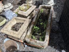 A PAIR OF SQUARE CONCRETE PLANTERS with quatrafoil detail to each facet, 34cm across along with a