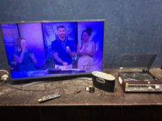 AN LG 43M7400PLB 43in SMART TV with remote, a Roberts Elise DAB radio and a retro record player (all