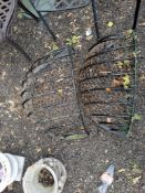 TWO QUARTER ROUND VINTAGE WROUGHT IRON HAY RACKS, with chicken wire mounted to the inside, 86 cm
