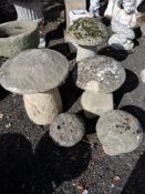 FIVE MODERN CONCRETE STADDLE STONES, all of varying sizes and with tops, the largest being 59cm high