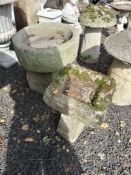 A CIRCULAR SANDSTONE TROUGH, 52cm in diameter, a sandstone base 34cm high, and a birdbath Qty: 3