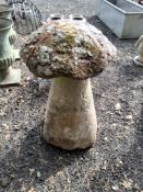 A VINTAGE SANDSTONE STADDLE STONE, with a red sandstone top, 83cm high Condition Report:chips and