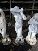 A LARGE CONCRETE GARDEN FIGURE, in the form of a scantily clad lady. Dimensions:117cm high