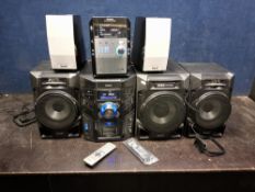 A PHILIPS FWM60B HI FI with two speakers and subwoofer (CD doesn't appear to read discs) and a