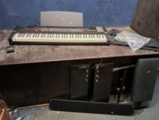 A ROLAND EP77 DIGITAL PIANO with power supply, footswitch, stool and stand (both taken apart) (PAT