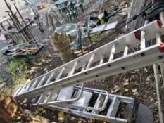 AN ALUMINIUM DOUBLE EXTENSION LADDER with 11 rungs to each 310cm section, along with 3 step