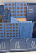 A box containing 28x Whitman folders, 2x for Halfpences, 21 for One Pences and 5x Brass Threepences,