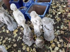 FIVE CONCRETE GARDEN FIGURES, including three ladies, the tallest being 77cm high, an otter and a