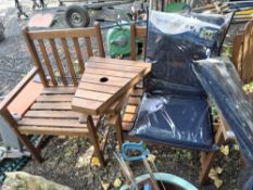 A PAIR OF HARDWOOD GARDEN CHAIRS WITH ANGLED CENTRAL SUPPORTS and cushions (6) Condition Report:no