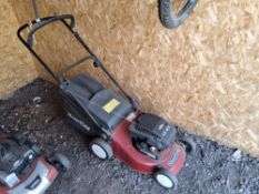 A MOUNTFIELD PETROL LAWN MOWER with grassbox (engine pulls freely but hasn't been started)