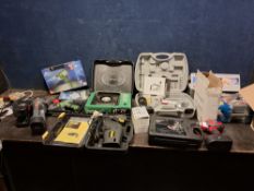 A COLLECTION OF POWER TOOLS including Black and Decker power file, a McKellar sabre saw, a