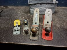 FOUR STANLEY AND RECORD WOOD PLANES, comprising an RB5 and No.87 block planes, a No.5 and a Record