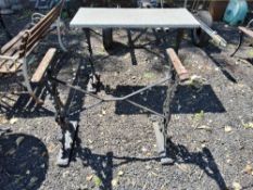Two black painted Cast iron table bases, one with a missing top Qty: 2 Condition Report:repainted,
