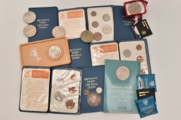 A bag containing a Queen Victoria 1890 Crown, 2x silver threepences 1914 and 1938, 10x QEII Crowns