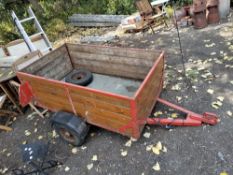 A WOODEN SIDED TRAILER with a single axle, towing hitch, and electric bed length 155cm Condition
