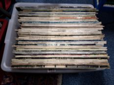 TWO BOXES AND LOOSE VINYL ALBUMS AND A SEWING MACHINE albums from artists such as Joan Biaz,