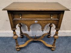 A WILLIAM AND MARY STYLE OAK LOWBOY, fitted with a single drawer, raised on turned and tapered legs,