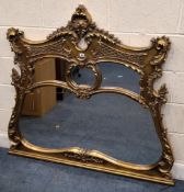 A REPRODUCTION GILT WOOD OVERMANTEL MIRROR, with scrolled, foliate and floral details Dimensions: