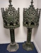 A PAIR OF GREEN PAINTED AND GILT ECCLESIASTICAL PILLARS, the octagonal top with gothic crocketed