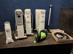 A G TECH PRO CORDLESS VACUUM CLEANER AND FOUR OIL FILLED RADIATORS, including PSU and accessories