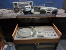 A SCHNEIDER TEAM 2000 MUSIC CENTRE in cabinet, a Roberts RC15 radio cassette, along with a