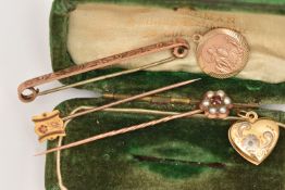 A 9CT GOLD ST. CHRISTOPHER PENDANT, A YELLOW METAL HEART LOCKET, WITH TWO STICK PINS AND A BROOCH,